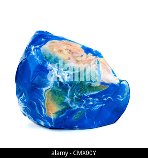 Deflated Earth Globe cut out on white background Stock Photo - Alamy