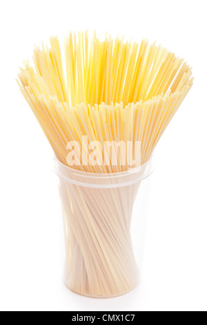 Bunch of spaghetti in plastic box isolated on white Stock Photo