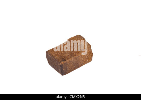 Piece of hashish isolated on white background Stock Photo