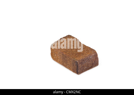 Piece of hashish isolated on white Stock Photo