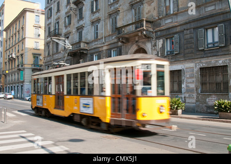 Vintage yellow tram car in Milan Stock Photo