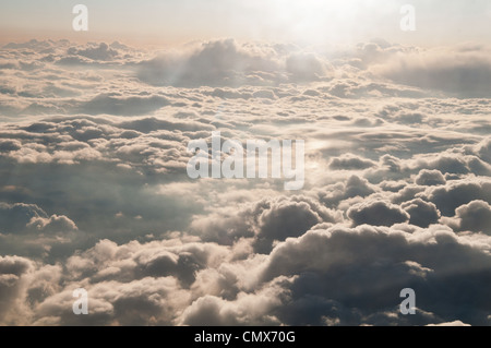 Picture from aircraft cabin above clouds. Stock Photo