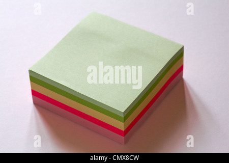 pad of blank multi coloured sticky notes to add text to isolated on white background Stock Photo