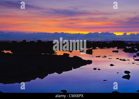 Sunset at the Pacific with lava in the foreground - The Big Island, Hawaii Stock Photo
