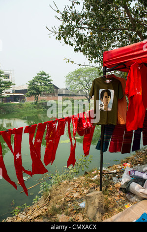 Vendor selling t-shirts and souvenirs raising money for the National League for Democracy (NLD) in Mandalay Stock Photo