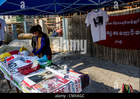 Vendor selling t-shirts and souvenirs raising money for the National League for Democracy (NLD) in Heho Myanmar Stock Photo