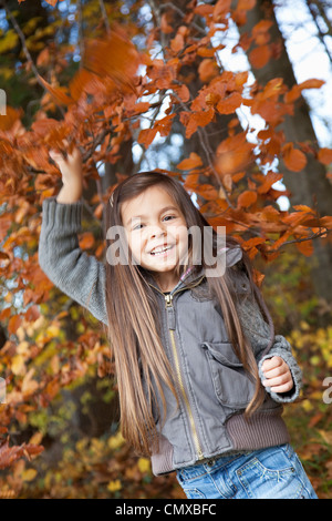 Germany, Huglfing, Girl smiling, portrait Stock Photo