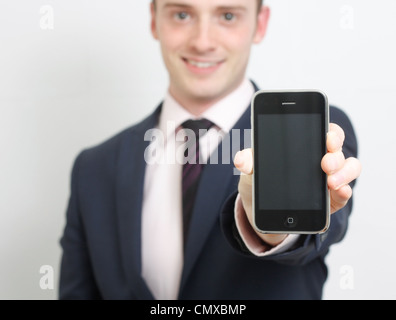 A business man showing his phone Stock Photo
