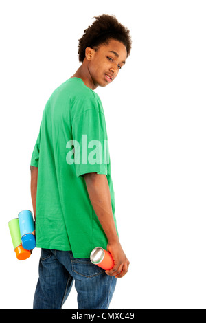 Portrait of a black boy spraying graffiti Stock Photo