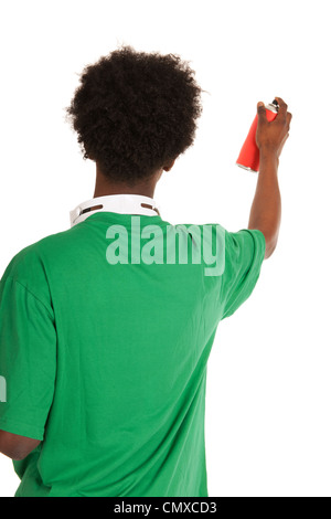 Black graffiti artist with aerosol in front of white background Stock Photo