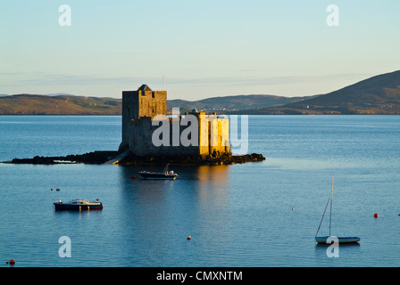 Kisimul Castle seat of Clan MacNeil in the harbour of Castlebay on the ...