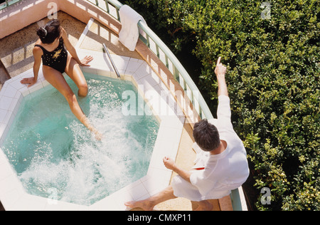 Couple relaxing in hot tub at the Renaissance Vinoy Resort St. Petersburg, Florida, USA Stock Photo
