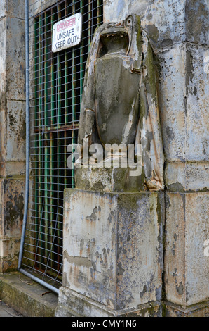 Detail from a neglected tomb at the Glasgow Necropolis, complete with  Health & Safety notice. Stock Photo