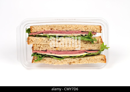 Salami and cheese takeaway sandwich on whole wheat bread with lettuce in packet Stock Photo