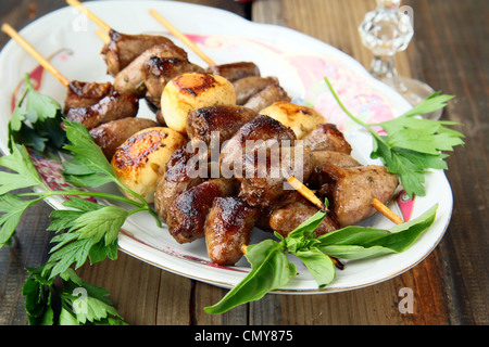 Fried grilled chicken hearts on skewers Stock Photo