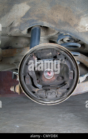 Old brake pads and cylinder brake drum Stock Photo