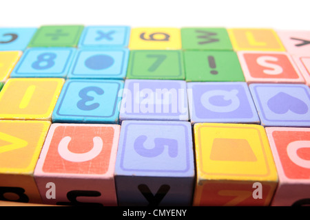 childrens toy letter building blocks against a white background Stock Photo