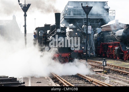 A German steam locomotive in full steam at Hilbersdorf Steam Shed near Chemnitz, Germany Stock Photo