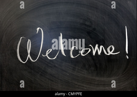 Chalk writing - Welcome word written on chalkboard Stock Photo
