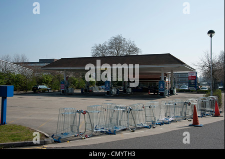 Fuel Crisis, March 2012. Shopping trolleys block the entrance to closed petrol station at Tesco's store, Fleetsbridge, Poole. Stock Photo
