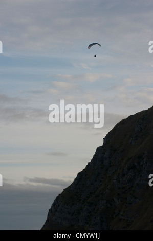 Paraglider at sunset, at Te Mata peak, near Havelock North in the Hawkes Bay region of New Zealand. Stock Photo