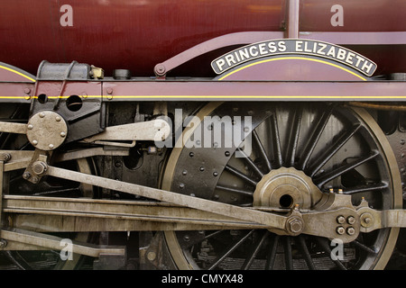 Nameplate ,driving wheels and valvegear of preserved LMS steam locomotive 6201 'Princess Elizabeth'. Stock Photo