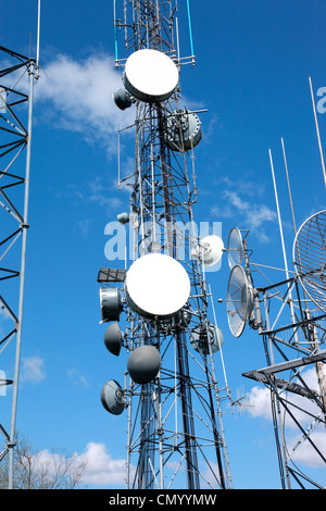 Satellite dishes, telecommunication & cell towers technology. Stock Photo