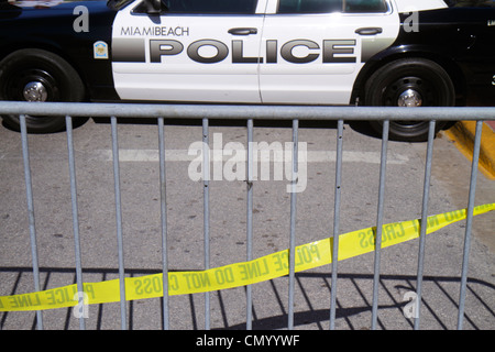 Miami Beach Florida,Ocean Drive,police department car,barrier,police line do not cross tape,crime,investigation,scene,FL120101119 Stock Photo
