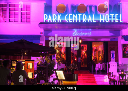 Miami Beach Florida,Ocean Drive,Art Deco Historic District,Park Central,hotel,New Year's Eve,night evening,palm trees,lighting,neon sign,Quinn's,resta Stock Photo