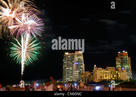 Miami Beach Florida,public beach,night,Portofino,Continuum,high rise,condominiums,Marriot,hotel,New Year's Eve,fireworks tradition,FL120101152 Stock Photo
