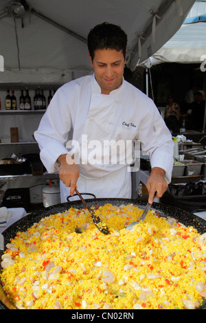 Miami Beach Florida,Ocean Drive,Art Deco Historic District,Art Deco Weekend,festival,man men male adult adults,cook,chef,large pan,seafood paella,food Stock Photo