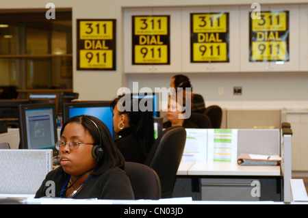 Operators take calls in the New York 311 Calling Center on January 10, 2004. (© Frances M. Roberts) Stock Photo