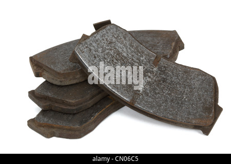 Old brake pads disk brake, isolated on a white background Stock Photo