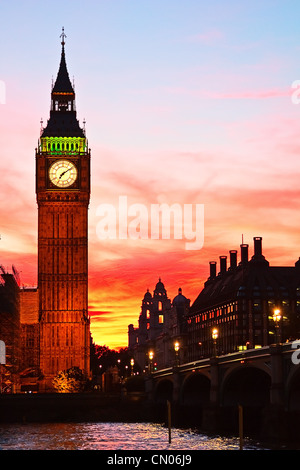 Dramatic sunset over famous Big Ben clock tower in London, UK.