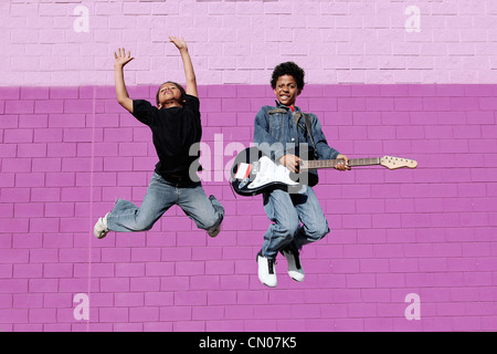 happy african descent kids playing music Stock Photo