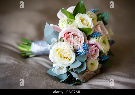 bouquet of spring flowers including: roses, muscari and ranunculus Stock Photo