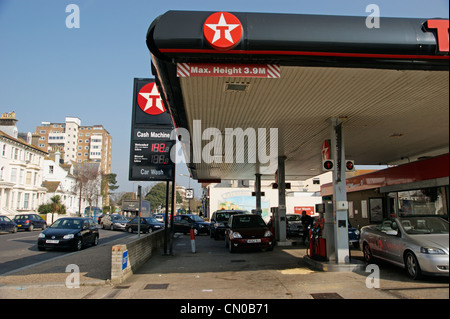 Fuel crisis - Texaco petrol station garage forecourt full of cars with vehicles queueing in the road