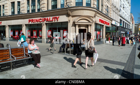 Pedestrians walking past the Principality Building Society on Queen Street and The Friary Cardiff Wales UK Stock Photo
