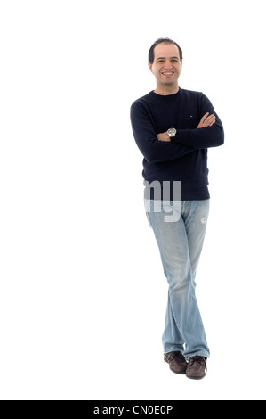 Full length portrait of young man with arms crossed isolated on white background Stock Photo