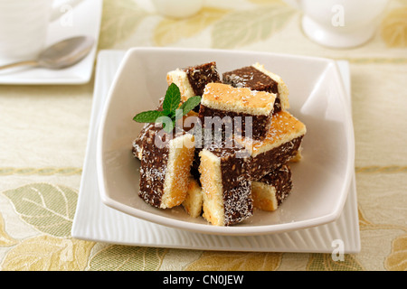 Little pastries with chocolate and pine nuts. Recipe available Stock Photo