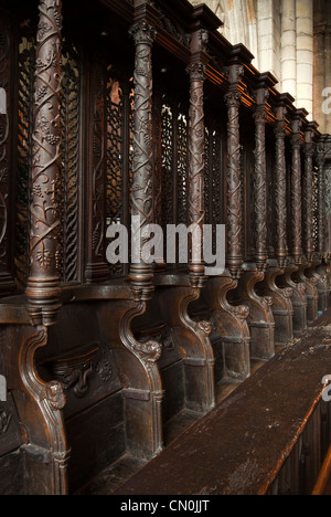 UK, Cumbria, Cartmel Priory interior, ornately carved Choir Stalls, screen and mistericords Stock Photo