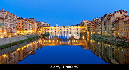 Europe, Italy, Florence, Ponte Vecchio over the Arno River at Dusk Stock Photo