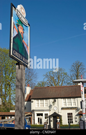 green man pub sign with pub in background, belonging to young's ram brewery, putney, southwest london, england Stock Photo