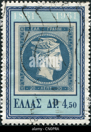 A stamp printed in Greece, is dedicated to the 100th anniversary of the first Greek postage stamp, depicts the head of Hermes. Stock Photo