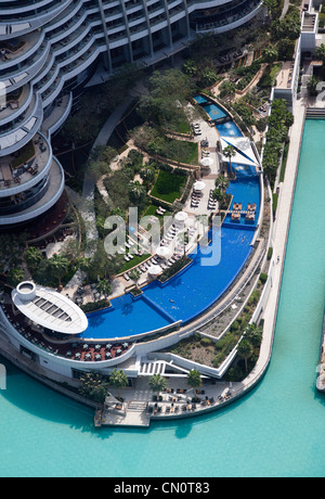 The swimming pool of 'The Address Downtown Dubai ' hotel, in Dubai (the United Arab Emirates) = The Address Downtown Burj Dubai. Stock Photo