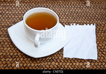 tea and blank paper on sedge background Stock Photo