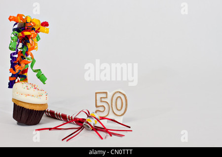 Cupcakes and ribbons all signs of a great celebration of graduation, birthday, anniversary, or holidays. Stock Photo