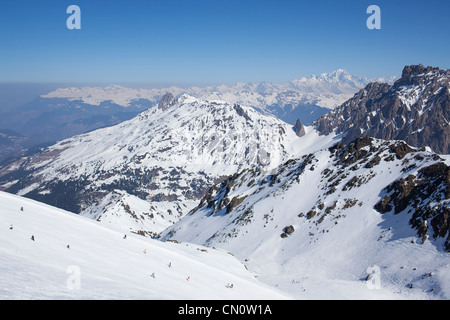 Skiers on the slopes of the Alps Stock Photo