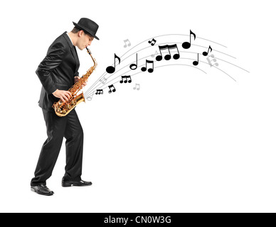 Full length portrait of a man playing on saxophone and notes coming out isolated against background Stock Photo