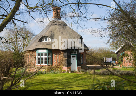 Thatched round house at Easton, Suffolk, England Stock Photo